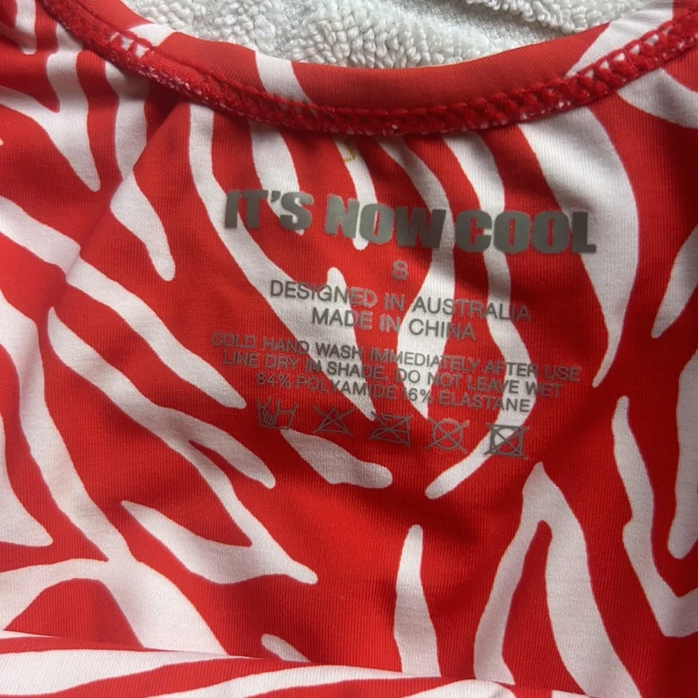 NWT FP x ITS NOW COOL the showtime one piece in fuego Zebra red white size small
